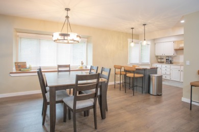 Incredible and updated Trapper Woods condo, nestled in the on Canadian Lakes Country Club-The Pines Course in Michigan - for sale on GolfHomes.com, golf home, golf lot