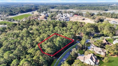 Design your dream home on this spacious corner wooded lot in the on Berkeley Hall Golf Club in South Carolina - for sale on GolfHomes.com, golf home, golf lot