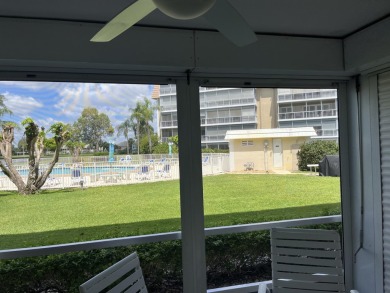 Very desirable bottom floor condo with views of the water, golf on Atlantis Golf Club in Florida - for sale on GolfHomes.com, golf home, golf lot