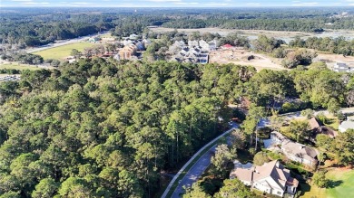 Design your dream home on this spacious corner wooded lot in the on Berkeley Hall Golf Club in South Carolina - for sale on GolfHomes.com, golf home, golf lot