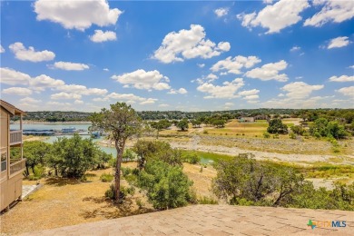 WITH THIS PROPERTY YOU GET AMAZING VIEWS AND A PRIVATE BOAT on Point Venture Golf Club on Lake Travis in Texas - for sale on GolfHomes.com, golf home, golf lot