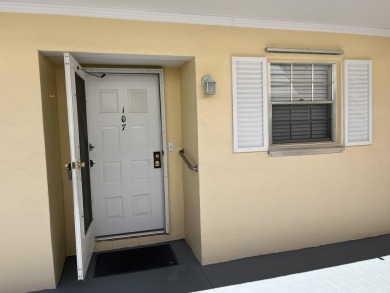 Very desirable bottom floor condo with views of the water, golf on Atlantis Golf Club in Florida - for sale on GolfHomes.com, golf home, golf lot
