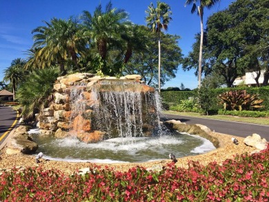 Very desirable bottom floor condo with views of the water, golf on Atlantis Golf Club in Florida - for sale on GolfHomes.com, golf home, golf lot