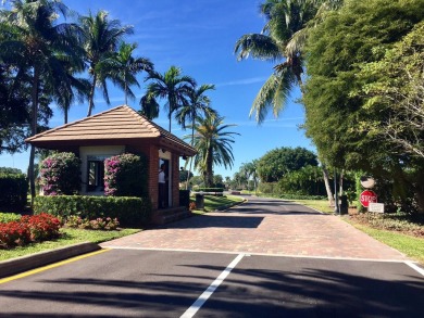 Very desirable bottom floor condo with views of the water, golf on Atlantis Golf Club in Florida - for sale on GolfHomes.com, golf home, golf lot