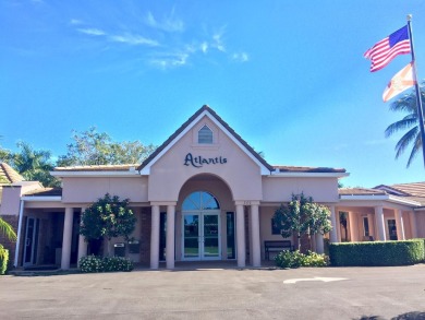 Very desirable bottom floor condo with views of the water, golf on Atlantis Golf Club in Florida - for sale on GolfHomes.com, golf home, golf lot