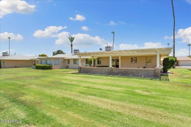 Double Fairway Home on the 10th hole.  This twin home has been on Sun City Country Club in Arizona - for sale on GolfHomes.com, golf home, golf lot