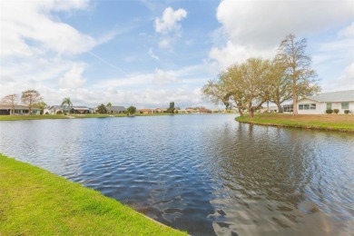 Experience Waterfront Living with Unmatched Sunsets and Wildlife on Caloosa Greens Executive Golf Course in Florida - for sale on GolfHomes.com, golf home, golf lot