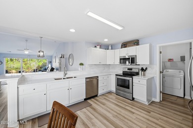 Welcome to 952 Wyndfall, a truly turnkey, beautifully updated on Sandpiper Bay Golf and Country Club in North Carolina - for sale on GolfHomes.com, golf home, golf lot