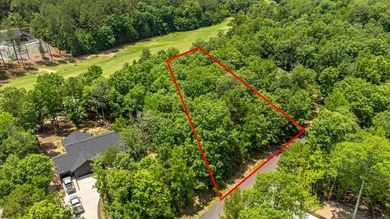 Build your dream home on this rare .53-acre lot located right on on Granada Golf Course in Arkansas - for sale on GolfHomes.com, golf home, golf lot