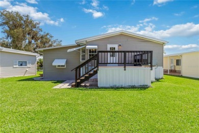 Check out this well-maintained 3-bedroom, 2-bathroom on Twin Isles Country Club in Florida - for sale on GolfHomes.com, golf home, golf lot