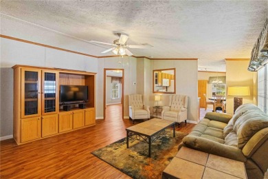 Check out this well-maintained 3-bedroom, 2-bathroom on Twin Isles Country Club in Florida - for sale on GolfHomes.com, golf home, golf lot