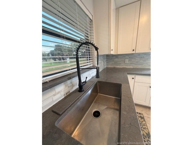 This 3-bedroom, 2-bath, 1-car garage villa in Quail Meadows at on  in Florida - for sale on GolfHomes.com, golf home, golf lot