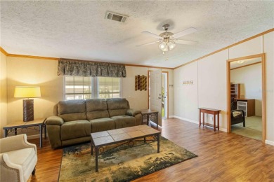 Check out this well-maintained 3-bedroom, 2-bathroom on Twin Isles Country Club in Florida - for sale on GolfHomes.com, golf home, golf lot