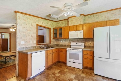 Check out this well-maintained 3-bedroom, 2-bathroom on Twin Isles Country Club in Florida - for sale on GolfHomes.com, golf home, golf lot