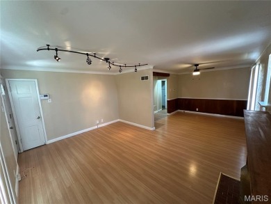 Omg!! Honey look at this home! Just walking distance from a Golf on Normandie Golf Club in Missouri - for sale on GolfHomes.com, golf home, golf lot
