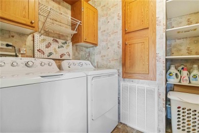 Check out this well-maintained 3-bedroom, 2-bathroom on Twin Isles Country Club in Florida - for sale on GolfHomes.com, golf home, golf lot