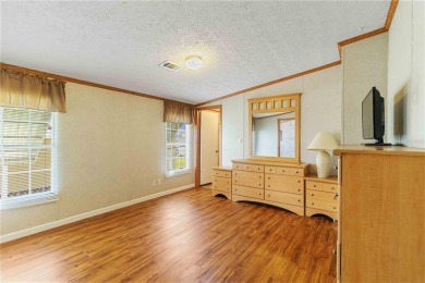 Check out this well-maintained 3-bedroom, 2-bathroom on Twin Isles Country Club in Florida - for sale on GolfHomes.com, golf home, golf lot