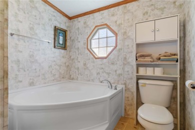 Check out this well-maintained 3-bedroom, 2-bathroom on Twin Isles Country Club in Florida - for sale on GolfHomes.com, golf home, golf lot