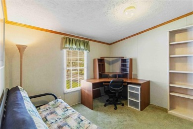 Check out this well-maintained 3-bedroom, 2-bathroom on Twin Isles Country Club in Florida - for sale on GolfHomes.com, golf home, golf lot