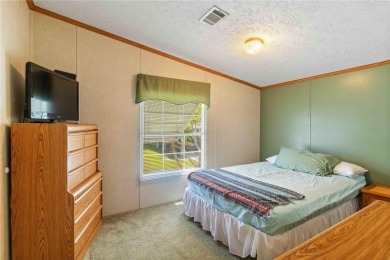 Check out this well-maintained 3-bedroom, 2-bathroom on Twin Isles Country Club in Florida - for sale on GolfHomes.com, golf home, golf lot