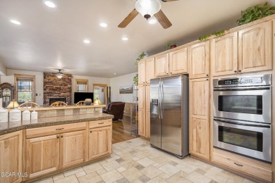 This great ranch style home is in perfect condition! You will on Grand Elk Ranch and Club in Colorado - for sale on GolfHomes.com, golf home, golf lot