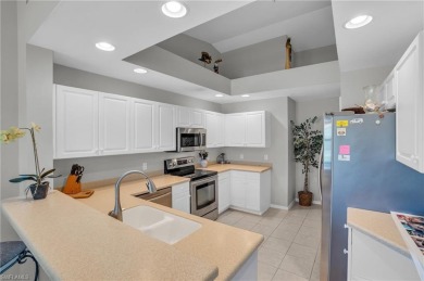 Discover the epitome of Florida living at 3435 Laurel Greens Ln on Cypress Woods Golf and Country Club in Florida - for sale on GolfHomes.com, golf home, golf lot