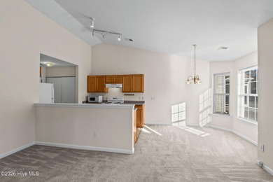 A 3 Bedroom 2 Bathroom Rancher with a 2-car Garage minutes from on Sandpiper Bay Golf and Country Club in North Carolina - for sale on GolfHomes.com, golf home, golf lot