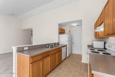 A 3 Bedroom 2 Bathroom Rancher with a 2-car Garage minutes from on Sandpiper Bay Golf and Country Club in North Carolina - for sale on GolfHomes.com, golf home, golf lot