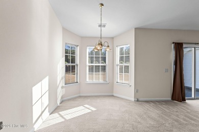 A 3 Bedroom 2 Bathroom Rancher with a 2-car Garage minutes from on Sandpiper Bay Golf and Country Club in North Carolina - for sale on GolfHomes.com, golf home, golf lot