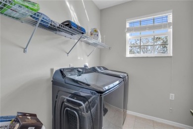 Discover the epitome of Florida living at 3435 Laurel Greens Ln on Cypress Woods Golf and Country Club in Florida - for sale on GolfHomes.com, golf home, golf lot