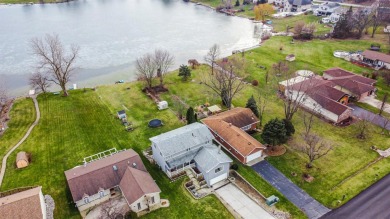 Here's your chance to be on the LAKE! Ranch style home situated on Lake of Four Seasons Country Club in Indiana - for sale on GolfHomes.com, golf home, golf lot