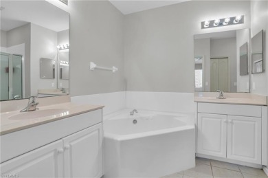 Discover the epitome of Florida living at 3435 Laurel Greens Ln on Cypress Woods Golf and Country Club in Florida - for sale on GolfHomes.com, golf home, golf lot