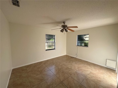 Move in ready! Remodeled just a few years ago. Two bedrooms with on Zephyrhills Municipal Golf Course in Florida - for sale on GolfHomes.com, golf home, golf lot