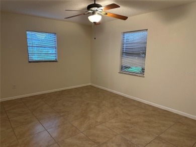 Move in ready! Remodeled just a few years ago. Two bedrooms with on Zephyrhills Municipal Golf Course in Florida - for sale on GolfHomes.com, golf home, golf lot