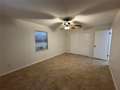 Move in ready! Remodeled just a few years ago. Two bedrooms with on Zephyrhills Municipal Golf Course in Florida - for sale on GolfHomes.com, golf home, golf lot