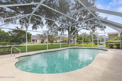 LIVE THE FLORIDA LIFESTYLE IN THIS SPACIOUS 3 BR, 2 BA, POOL on Plantation Bay Golf and Country Club in Florida - for sale on GolfHomes.com, golf home, golf lot