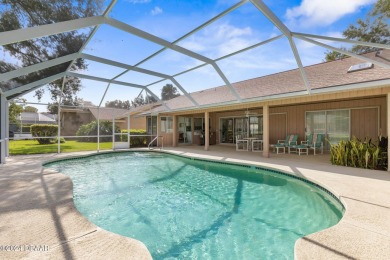 LIVE THE FLORIDA LIFESTYLE IN THIS SPACIOUS 3 BR, 2 BA, POOL on Plantation Bay Golf and Country Club in Florida - for sale on GolfHomes.com, golf home, golf lot