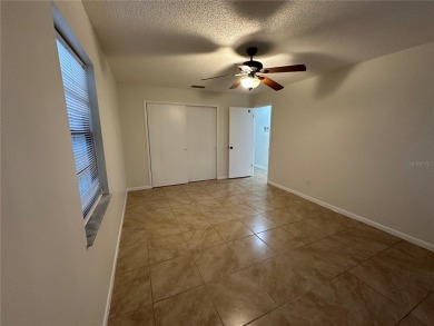 Move in ready! Remodeled just a few years ago. Two bedrooms with on Zephyrhills Municipal Golf Course in Florida - for sale on GolfHomes.com, golf home, golf lot