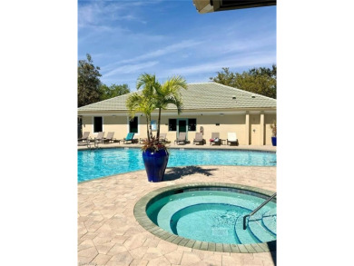 Discover the epitome of Florida living at 3435 Laurel Greens Ln on Cypress Woods Golf and Country Club in Florida - for sale on GolfHomes.com, golf home, golf lot