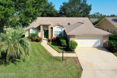 LIVE THE FLORIDA LIFESTYLE IN THIS SPACIOUS 3 BR, 2 BA, POOL on Plantation Bay Golf and Country Club in Florida - for sale on GolfHomes.com, golf home, golf lot