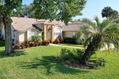 LIVE THE FLORIDA LIFESTYLE IN THIS SPACIOUS 3 BR, 2 BA, POOL on Plantation Bay Golf and Country Club in Florida - for sale on GolfHomes.com, golf home, golf lot