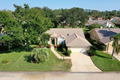 LIVE THE FLORIDA LIFESTYLE IN THIS SPACIOUS 3 BR, 2 BA, POOL on Plantation Bay Golf and Country Club in Florida - for sale on GolfHomes.com, golf home, golf lot