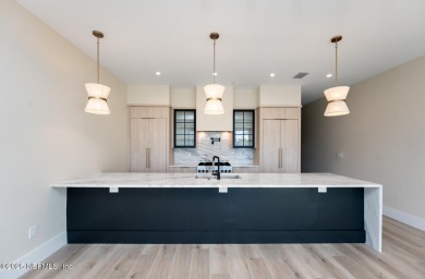 Stunning 3-story oceanview townhome, just one block from the on Jacksonville Beach Golf Course in Florida - for sale on GolfHomes.com, golf home, golf lot