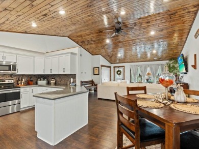 This modern, low-maintenance retreat is perfect for those who on Breezy Point Golf Course Resort in Minnesota - for sale on GolfHomes.com, golf home, golf lot