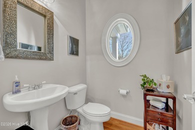 Welcome to 8948 Woodcreek Circle - where this 2006 built home on Porters Neck Country Club in North Carolina - for sale on GolfHomes.com, golf home, golf lot