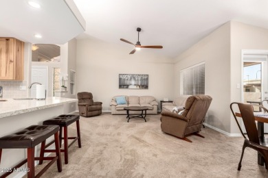 Discover the charm of this inviting 2-bedroom townhome in the on Fountain of the Sun Country Club in Arizona - for sale on GolfHomes.com, golf home, golf lot