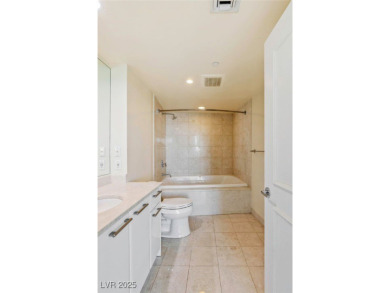 Just one block from the Las Vegas Strip, this residence blends on Las Vegas Country Club in Nevada - for sale on GolfHomes.com, golf home, golf lot