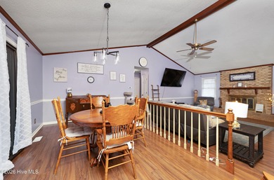 Tucked away on a wooded lot in Fairfield Harbour, this inviting on Harbour Point Golf Club in North Carolina - for sale on GolfHomes.com, golf home, golf lot