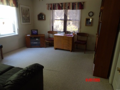 LOVELY 3 BEDROOM 2 BATH CUSTOM HOME ON THE 16TH HOLE OF CORONADO on Coronado Golf Course in Arkansas - for sale on GolfHomes.com, golf home, golf lot