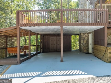 Come home to this impeccably maintained 3 BR/3 BA mountain cabin on White Path Golf Club in Georgia - for sale on GolfHomes.com, golf home, golf lot